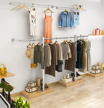 Giyim mağazası için vitrin rafı kadın giyim mağazası için özel vitrin rafı zemin tipi elbise askısı paslanmaz çelik raf