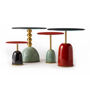 Italyan temperli cam ışık lüks tasarım yaratıcı yuvarlak sehpa High-End çay masası küçük yan sehpa